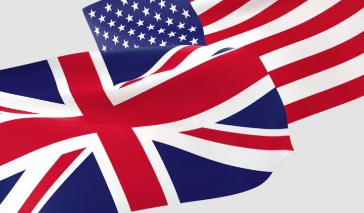 Wavy British and American flags overlapping with each other in front of a beige background. | MINI of Sterling in Sterling VA