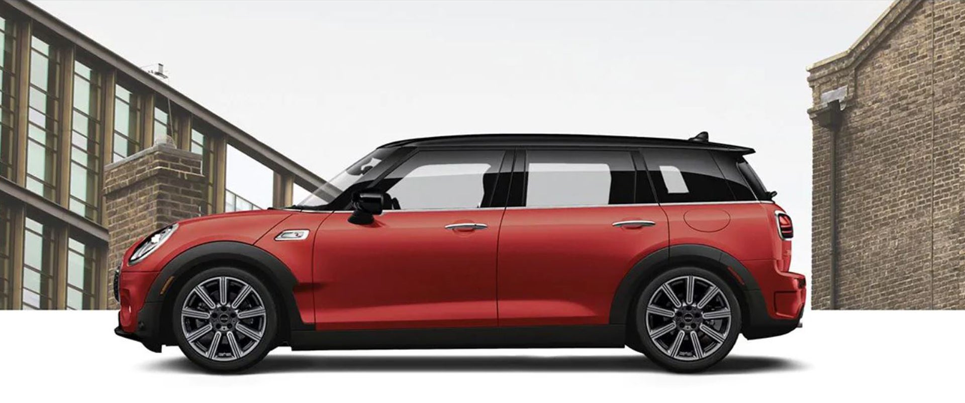 https://www.miniofsterling.com/static/brand-mini/2022-mini-clubman/The-2O22-MINI-Clubman-rolling-in-front-of-a-building.JPG