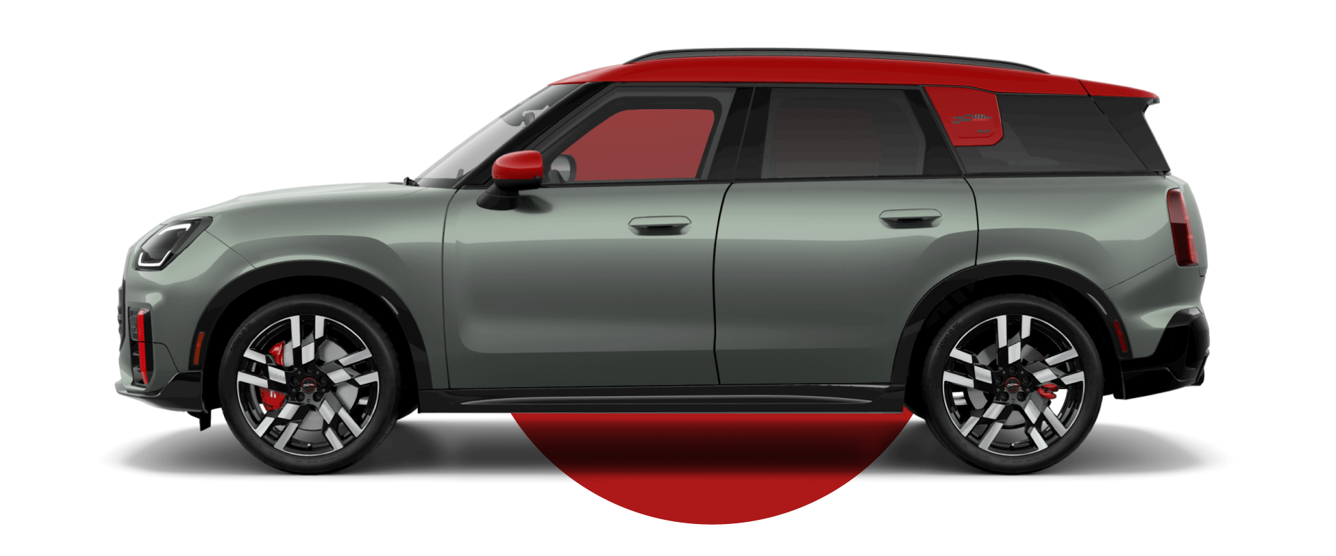 Side view of a MINI JCW Countryman ALL4 in the Smokey Green body color, facing left with its shadow underneath it.