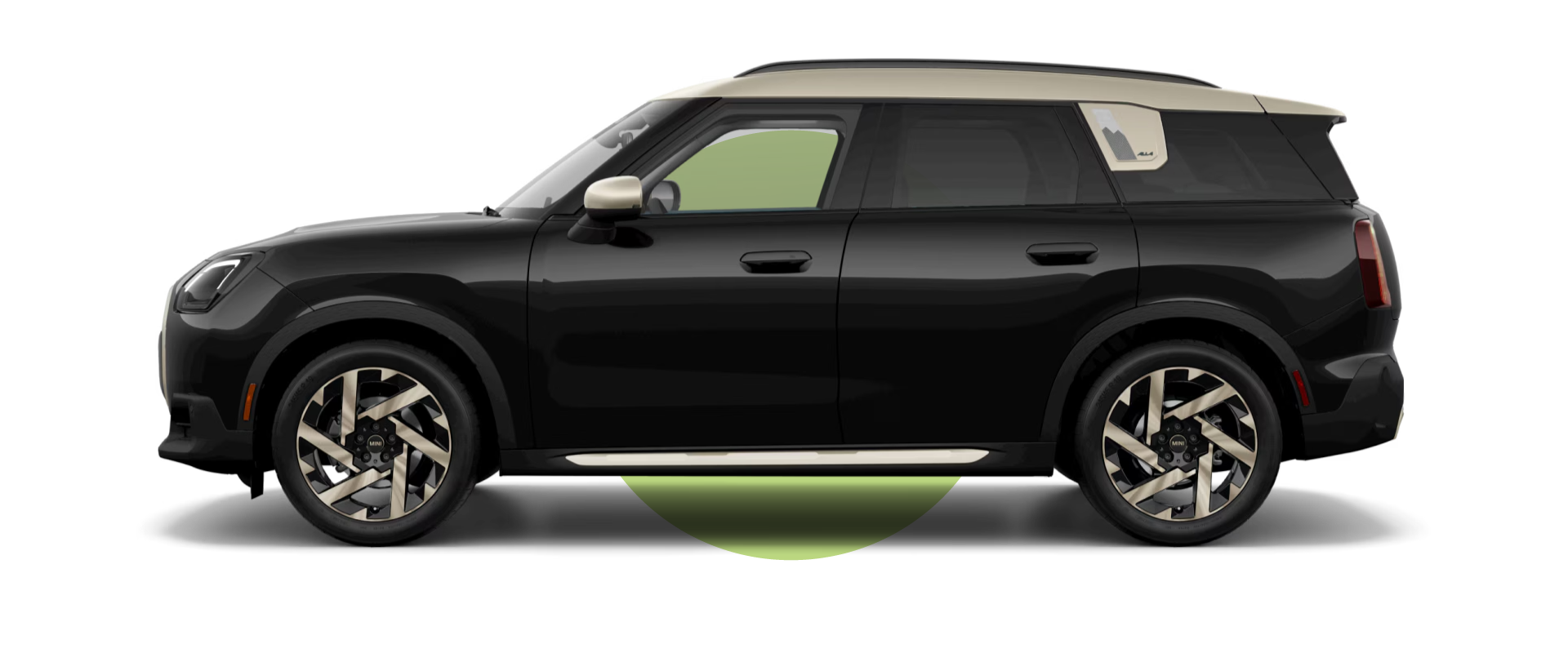 Side view of a MINI Countryman S ALL4 in the Midnight Black III body color, facing left with its shadow underneath it.