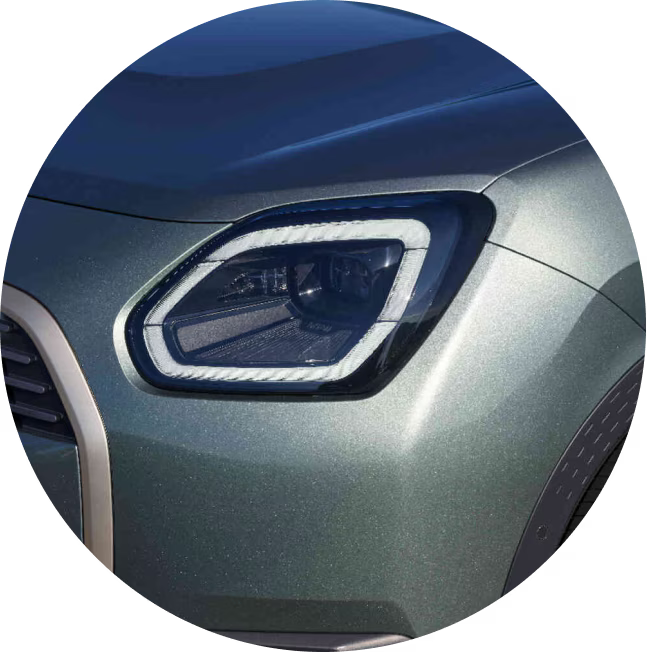 A close-up of the MINI Countryman S ALL4 headlights.