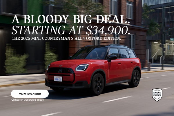 front view of Oxford Countryman driving up road. 