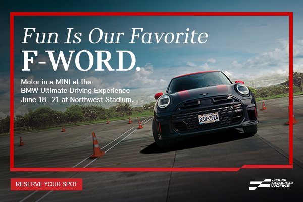 MINI JCW driving around corner.